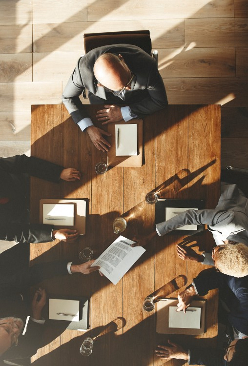 business-people-meeting-conference-brainstorming-vertical
